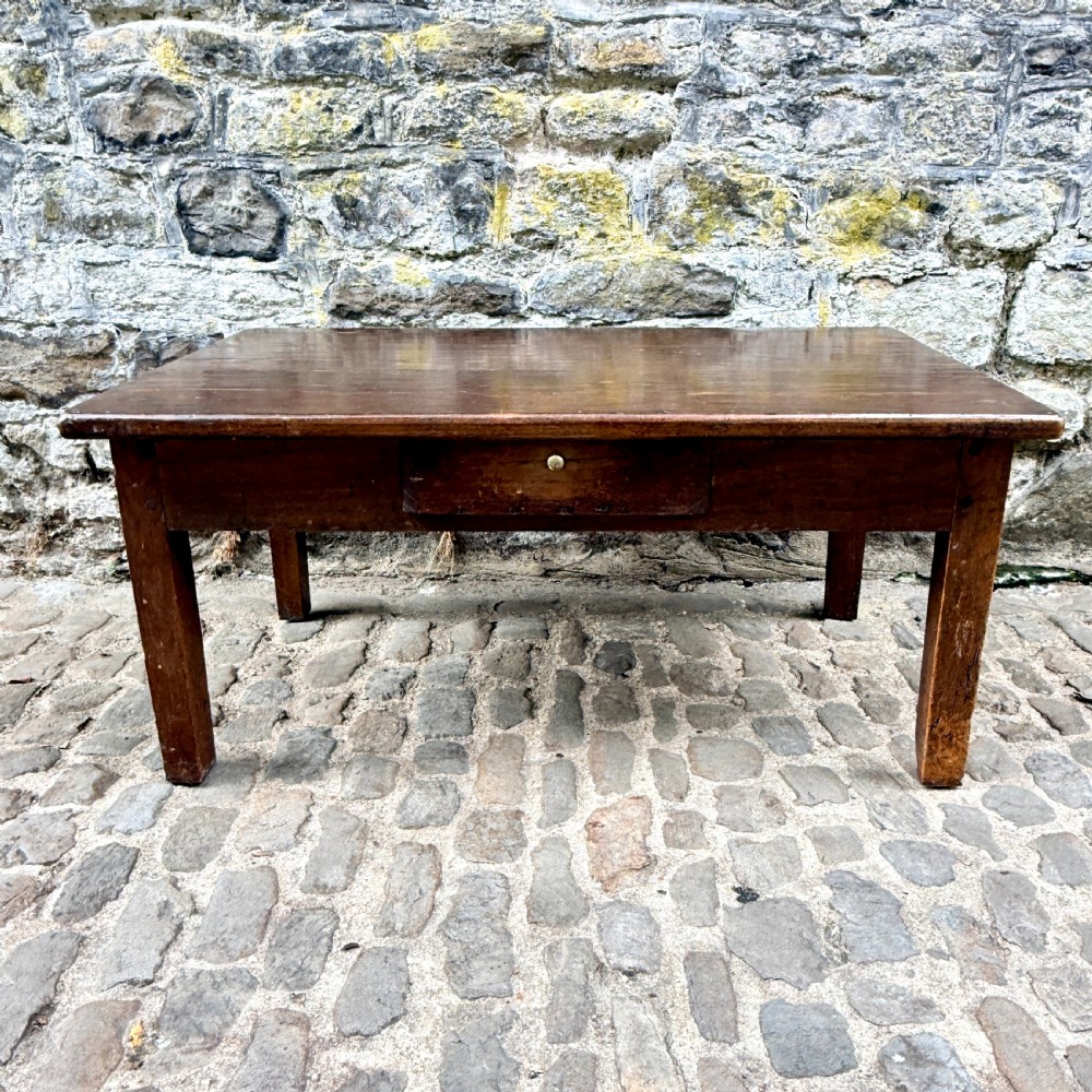 A low rectangular antique coffee table constructed from dark oak and chestnut, featuring a single frieze drawer and four straight square legs. View II