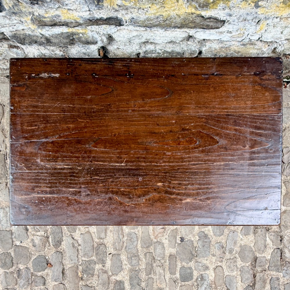 A low rectangular antique coffee table constructed from dark oak and chestnut, featuring a single frieze drawer and four straight square legs. View III