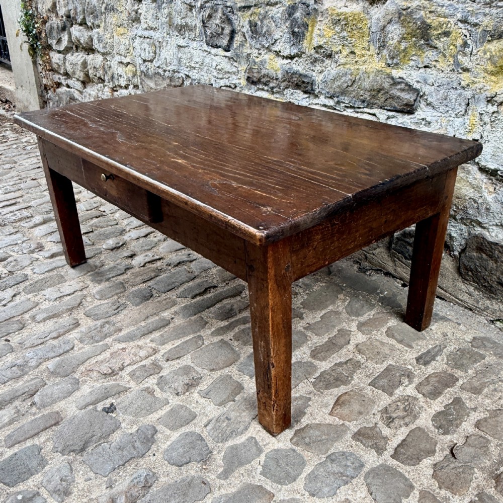 A low rectangular antique coffee table constructed from dark oak and chestnut, featuring a single frieze drawer and four straight square legs. View IV