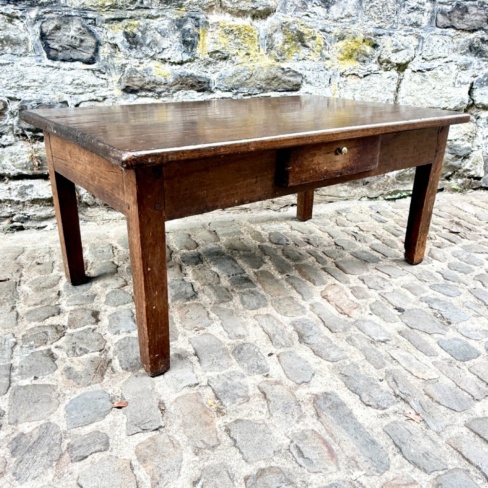 A low rectangular antique coffee table constructed from dark oak and chestnut, featuring a single frieze drawer and four straight square legs. View V