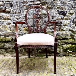 A LATE 19TH CENTURY HEPPLEWHITE STYLE ELBOW CHAIR