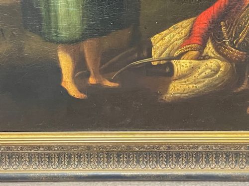 fig 6. A 19th-century oil painting depicting a wounded figure in traditional costume sitting beside a black horse and two women, housed in a moulded gilt frame.