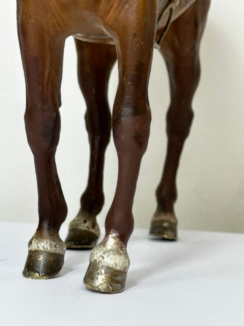 fig 1. A Victorian cold-painted bronze figure depicting a standing bay hunter horse complete with detailed saddle and bridle.