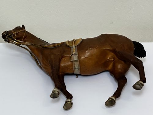 fig 2. A Victorian cold-painted bronze figure depicting a standing bay hunter horse complete with detailed saddle and bridle.