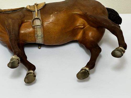 fig 3. A Victorian cold-painted bronze figure depicting a standing bay hunter horse complete with detailed saddle and bridle.
