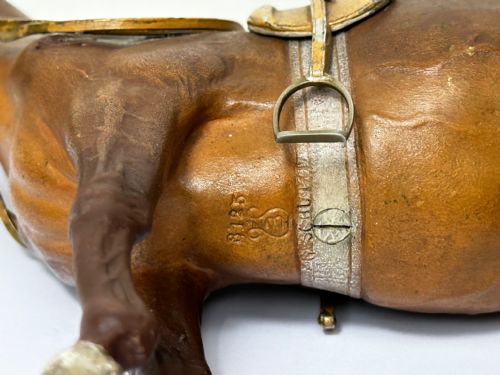 fig 5. A Victorian cold-painted bronze figure depicting a standing bay hunter horse complete with detailed saddle and bridle.