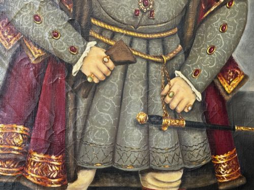 fig 6. A large oil painting in a gilded frame depicting King Henry VIII standing in Tudor costume with jewels, dagger, and feathered cap against a dark backdrop.