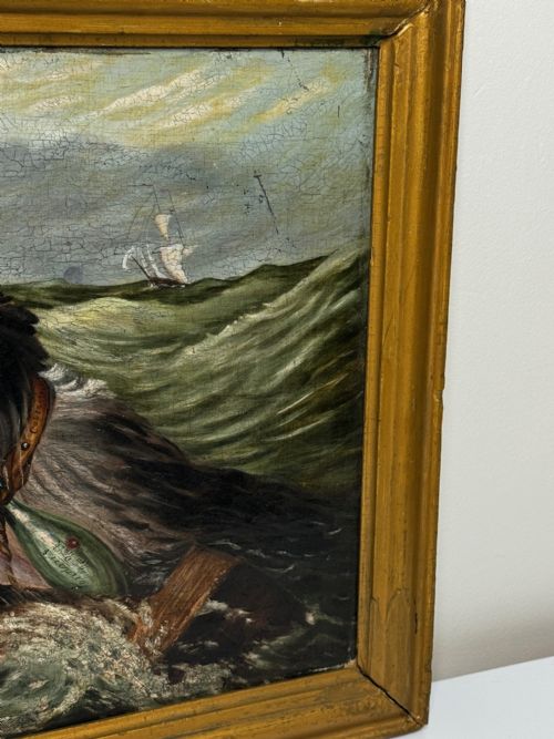 fig 2. An antique oil painting depicting a Saint Bernard dog swimming in sea waves while clinging to a wooden spar, set within a gilded wooden frame.