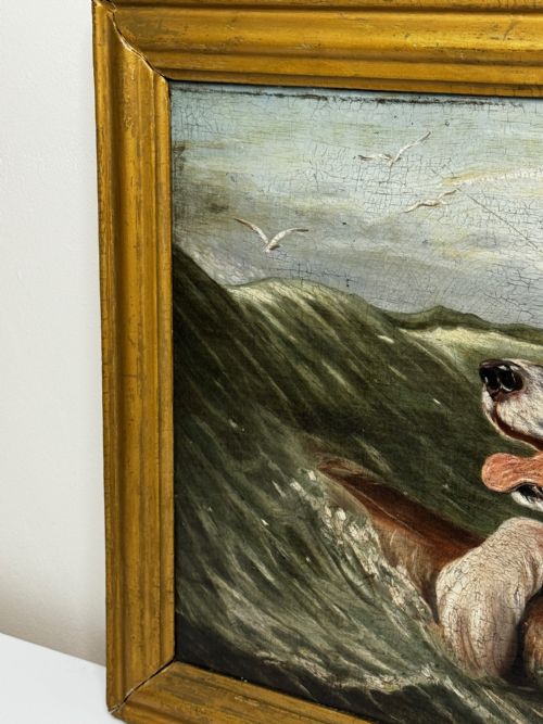 fig 3. An antique oil painting depicting a Saint Bernard dog swimming in sea waves while clinging to a wooden spar, set within a gilded wooden frame.