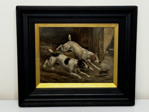 fig 1. A Victorian oil painting framed in ebonised timber and a gilt slip, depicting two white and dark-marked terriers pursuing a rat inside a barn.