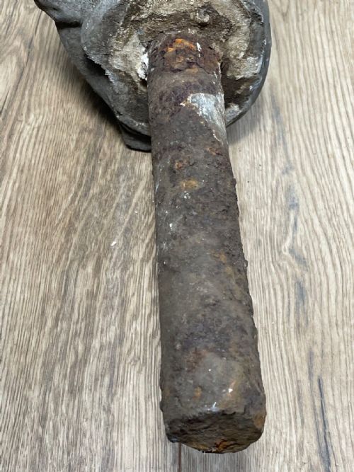 fig 3. A Victorian grey lead sculpture of a contemplative monkey mounted on a cylindrical metal stake.