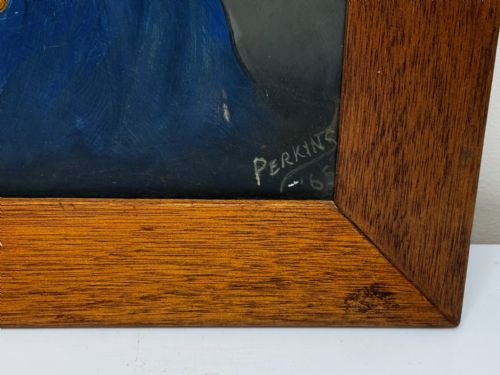 fig 6. A framed oil painting portraying General George Custer in profile wearing a blue uniform with gold stars and a black hat.