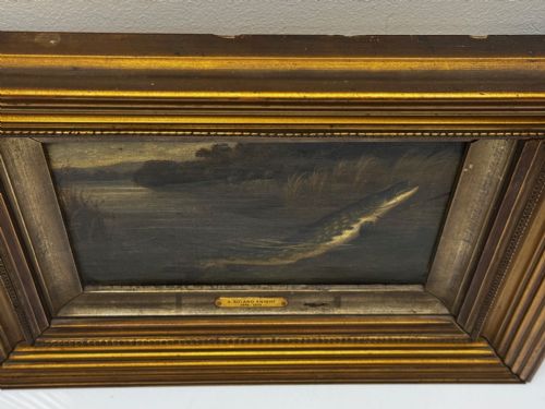 fig 6. An antique Victorian oil painting depicting a northern pike fish surfacing from a river, set within a gilded moulded frame.