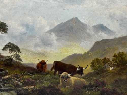 fig 3. A Victorian oil painting depicting three Highland cattle resting on a hillside in a misty Scottish mountain landscape, enclosed in a rectangular gilt frame.
