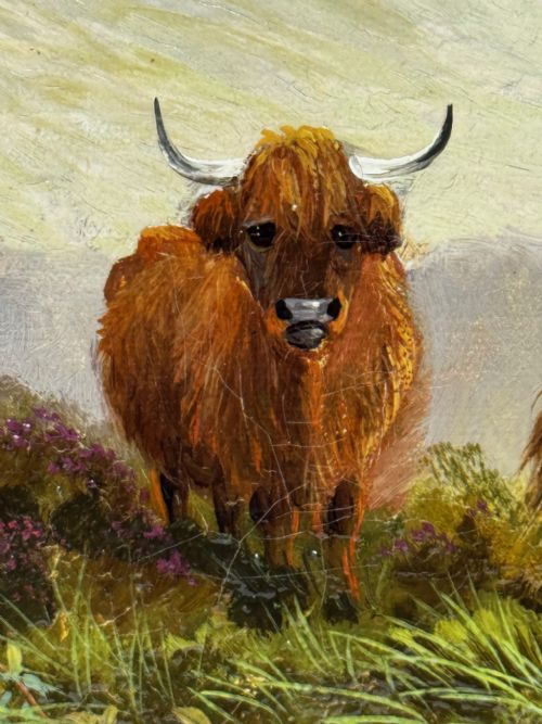 fig 9. A Victorian oil painting depicting three Highland cattle resting on a hillside in a misty Scottish mountain landscape, enclosed in a rectangular gilt frame.