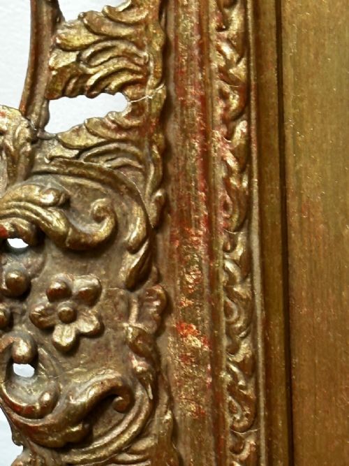 fig 5. An antique Victorian oil painting depicting two setters against a cloudy sky, presented in a carved gold gilt frame.