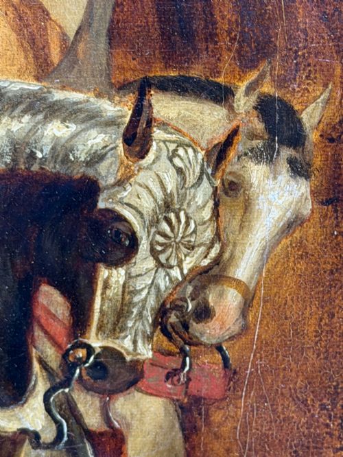 fig 10. An antique oil painting depicting a knight in full armour riding a horse beneath a stone archway, framed in an ornate gilded wood frame.