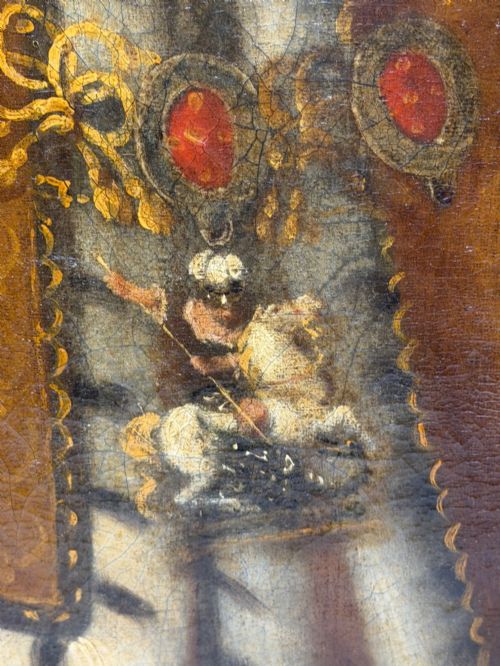 fig 9. An 18th-century oil painting depicting King William III in a curled wig and ermine cloak, set within an oval aperture inside an ornate rectangular gold carved frame.