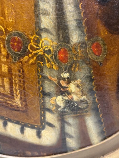 fig 10. An 18th-century oil painting depicting King William III in a curled wig and ermine cloak, set within an oval aperture inside an ornate rectangular gold carved frame.