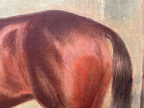 fig 10. A framed oil painting depicting a bay racehorse standing in a stable yard, housed in a moulded dark wood and gilt frame.