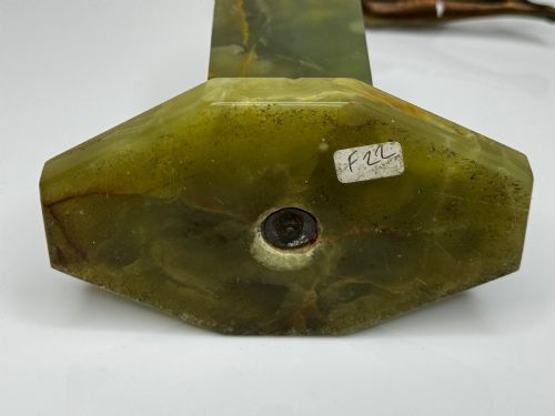 fig 2. An Art Deco bronze sculpture depicting a dancer with draped fabric, mounted on a green onyx pedestal base.
