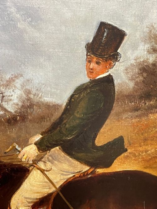 fig 5. An antique Victorian oil painting depicting horse riders in red hunting coats on grey and bay horses, housed within an ornate gilt frame.