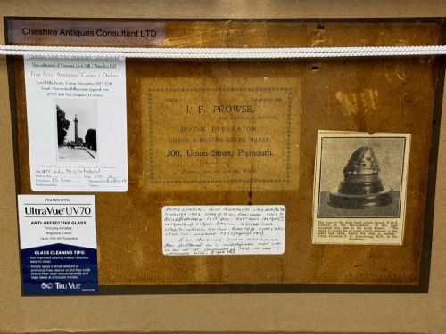 fig 4. A framed watercolour painting depicting the WW1 battleship HMS London at sea, presented in a wide gold gilt frame with a white mount.