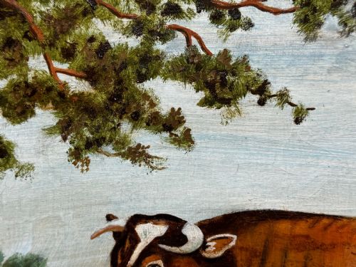 fig 4. An antique Victorian oil painting depicting a brown and white shorthorn bull in a grassy field within a gilded frame.