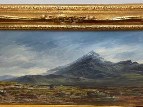 fig 8. A Victorian oil painting depicting the mountain peak of Sgurr nan Gillean in Skye, housed in a wide ornate gold gilt frame.