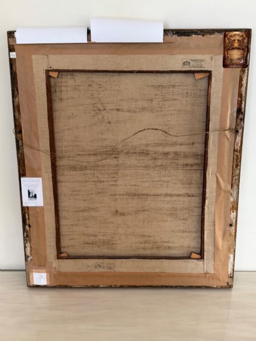 fig 3. An antique oil painting depicting a woman in a white gown and red shawl set within a beaded giltwood frame.