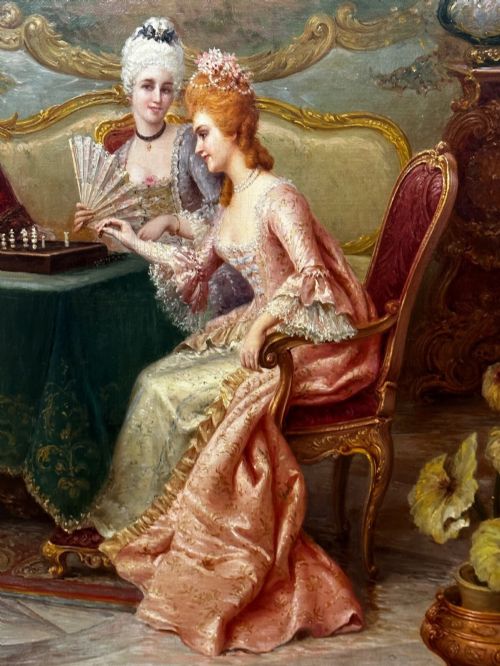 fig 2. An 19th-century framed oil painting depicting figures in period attire gathered around a table engaged in a game of chess.