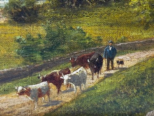 fig 4. A Victorian landscape oil painting depicting a Cumbrian valley with mountains and cattle, set within an ornate gilded frame.