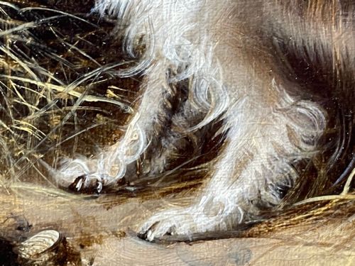fig 10. A 19th-century oil painting depicting three working terriers inside a straw-lined barn, presented in an ornate giltwood frame with detailed corner embellishments.