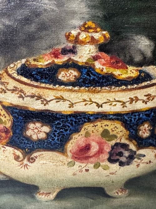 fig 3. An antique framed oil painting depicting five grey and cream Persian kittens positioned around a wicker basket and a floral porcelain teapot.