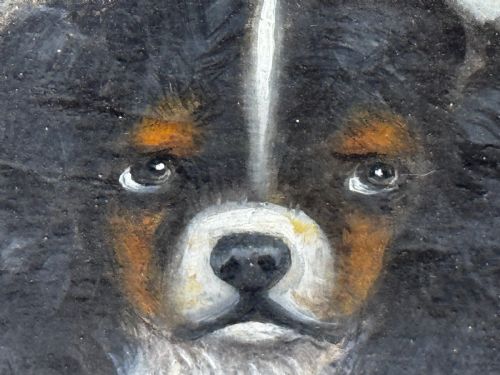 fig 10. A nineteenth-century framed oil painting depicting a Blenheim spaniel and a tricolour spaniel seated outdoors, enclosed within an ornate gold giltwood frame.