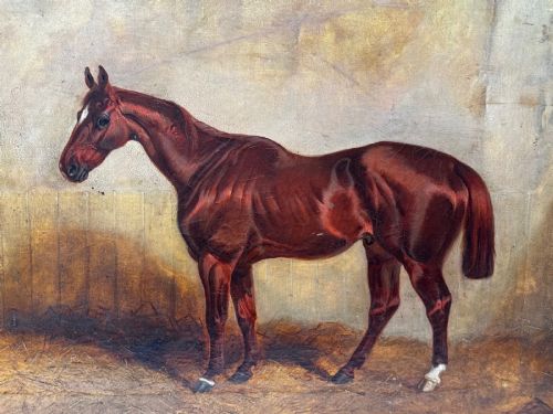 fig 1. An 1843 oil painting depicting a chestnut hunter horse standing in a stable, encased in an ornate gilded carved frame.