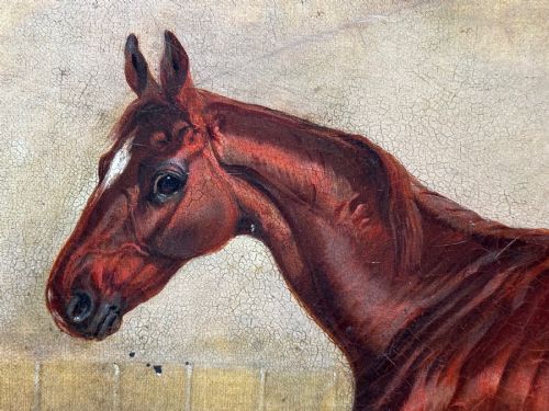 fig 3. An 1843 oil painting depicting a chestnut hunter horse standing in a stable, encased in an ornate gilded carved frame.