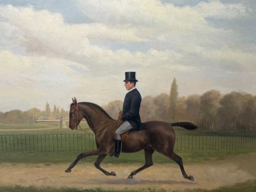 fig 5. A Victorian oil painting depicting a gentleman in formal riding attire atop a brown horse, framed within a wide gold gilded frame.