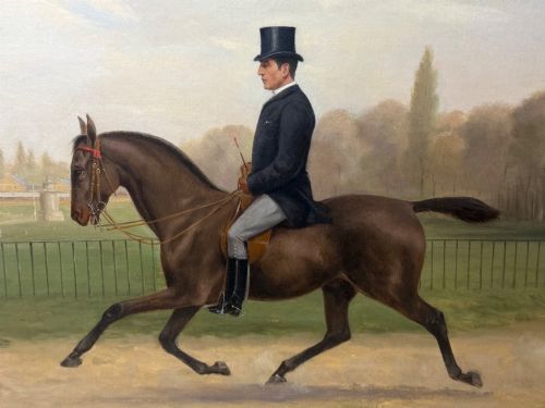 fig 6. A Victorian oil painting depicting a gentleman in formal riding attire atop a brown horse, framed within a wide gold gilded frame.
