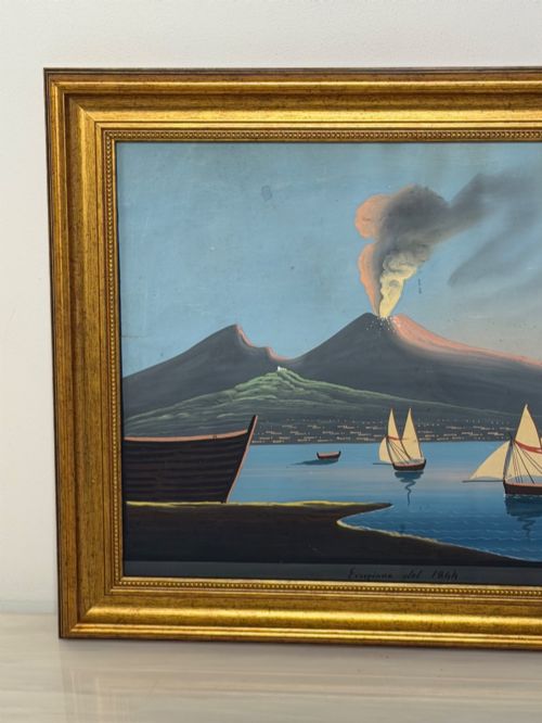 fig 2. A framed 19th-century gouache painting depicting the eruption of Mount Vesuvius over the Bay of Naples with sailboats in the foreground.