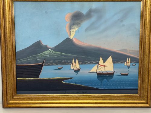 fig 3. A framed 19th-century gouache painting depicting the eruption of Mount Vesuvius over the Bay of Naples with sailboats in the foreground.