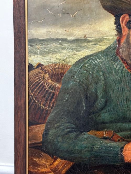 fig 4. An antique oil painting depicting a bearded fisherman in a green knitted jumper sitting in a boat with his catch, encased in a dark wooden frame.