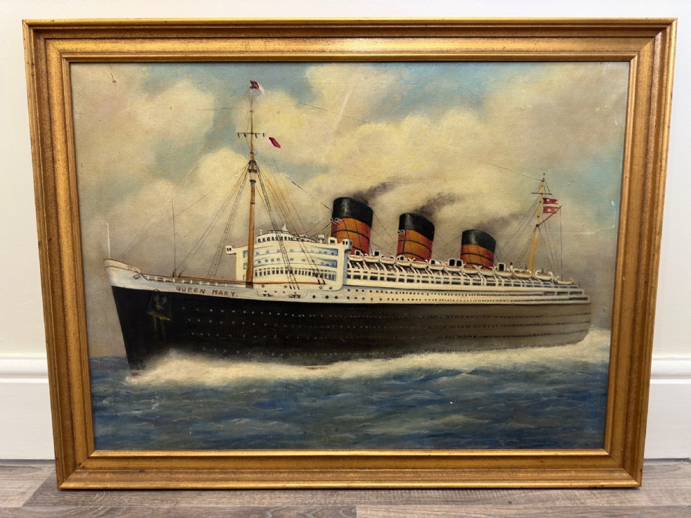 An oil painting depicting the RMS Queen Mary ocean liner sailing across blue waters under a cloudy sky, framed in a moulded gold gilt border. View II