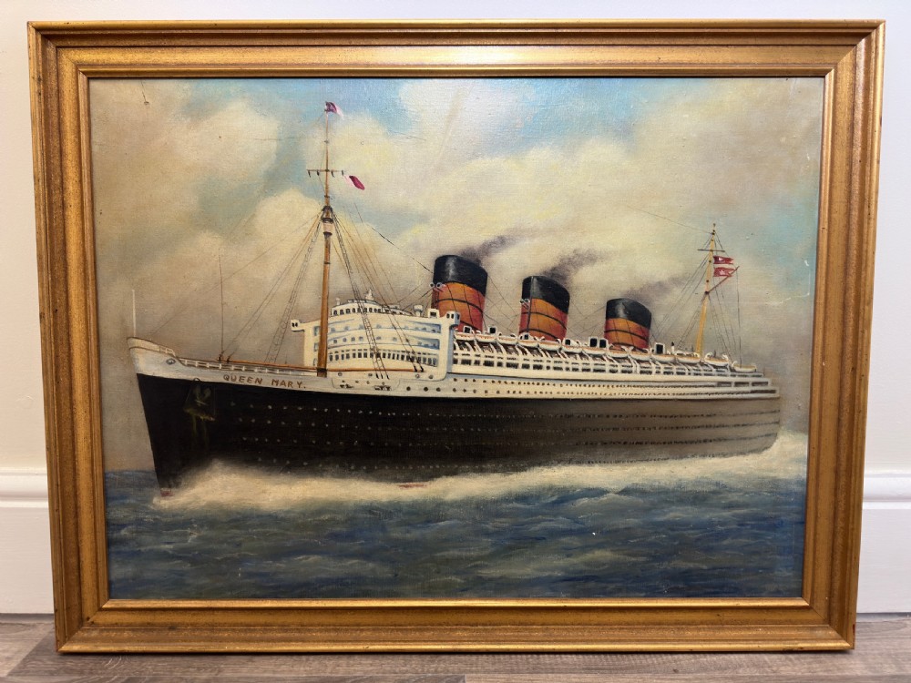 An oil painting depicting the RMS Queen Mary ocean liner sailing across blue waters under a cloudy sky, framed in a moulded gold gilt border. View IV