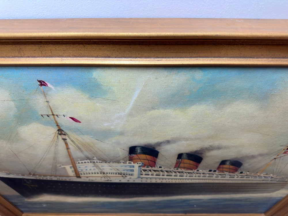 An oil painting depicting the RMS Queen Mary ocean liner sailing across blue waters under a cloudy sky, framed in a moulded gold gilt border. View VIII