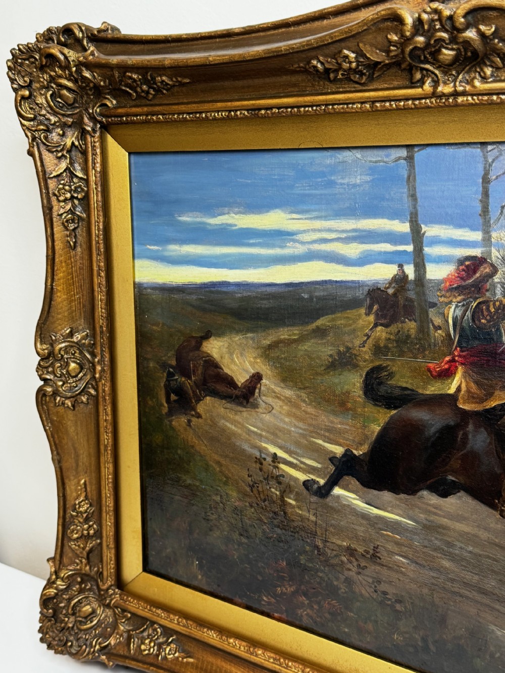 An antique Victorian oil painting featuring a horse chase scene encased within an ornate gilt frame. View IV