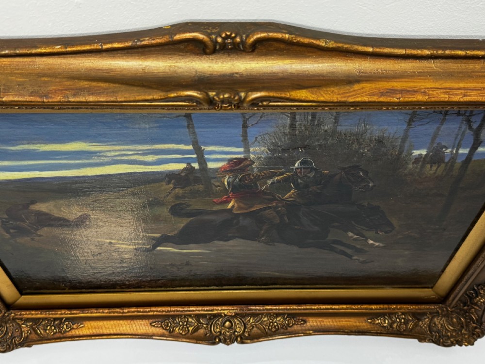 An antique Victorian oil painting featuring a horse chase scene encased within an ornate gilt frame. View VII