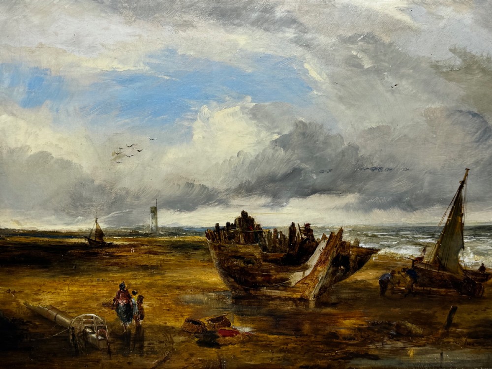An antique oil painting depicting a grounded wooden ship wreck on a sandy shoreline with a distant lighthouse, set in a gold gilded frame. View VI