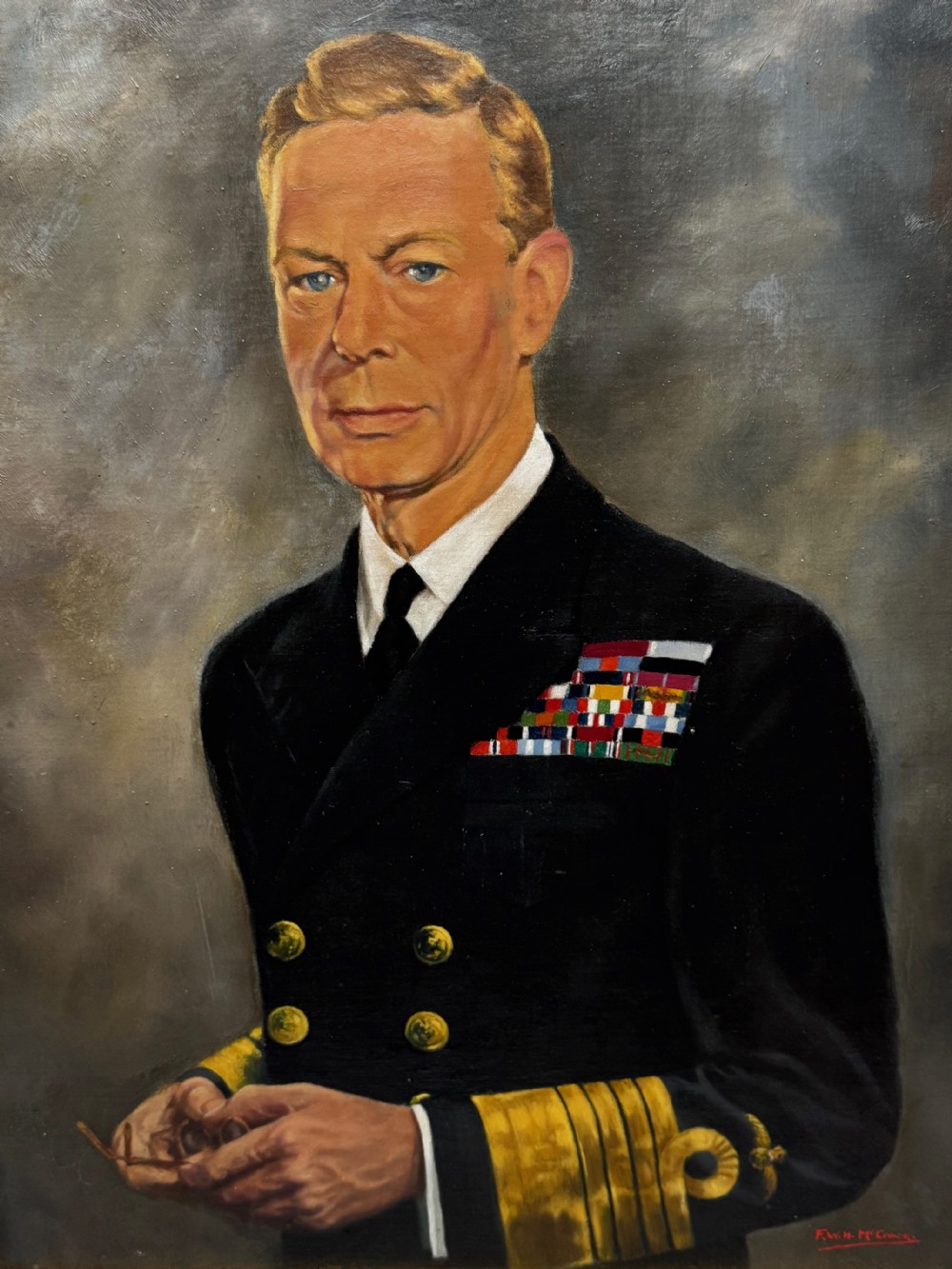 A framed oil painting depicting King George VI in a dark naval uniform with medal ribbons and gold sleeve braid against a grey background. View VIII
