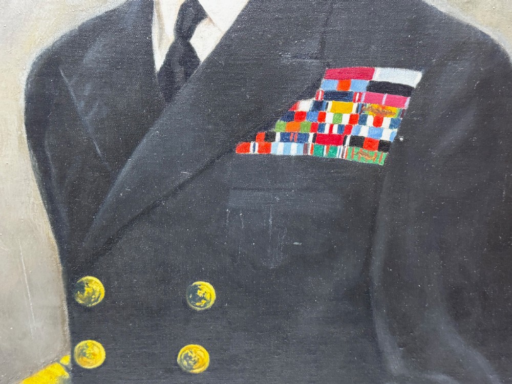 A framed oil painting depicting King George VI in a dark naval uniform with medal ribbons and gold sleeve braid against a grey background. View XV
